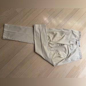 Men’s khakis gently used by Mauricio Baldezeri